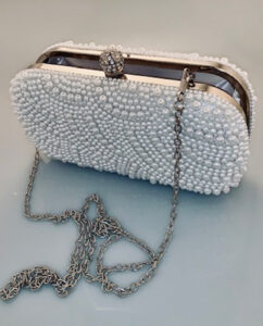 Wedding pearl clutch. Elegant clutch adorned with a mother-of-pearl pattern. Gudnitz Copenhagen.